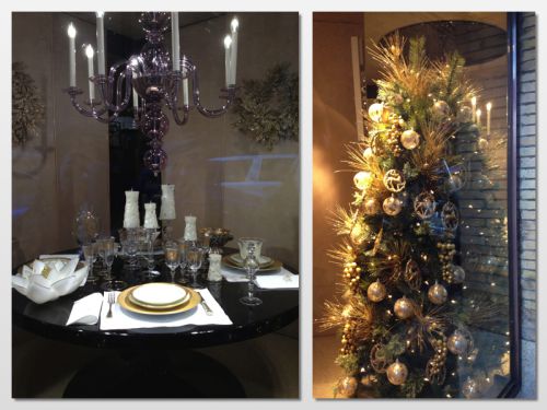 クリスマス用テーブルセッティングとクリスマスツリーに彩られたエレガントなショーウィンドウ