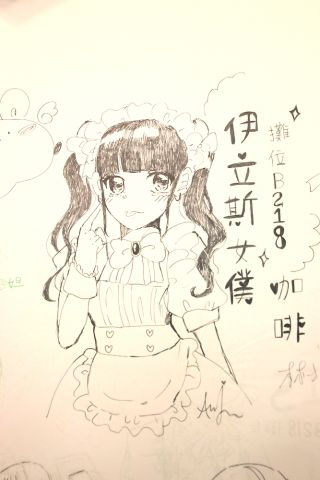 落書きコーナーのすぐ近くに出店していたメイドカフェのCMイラスト