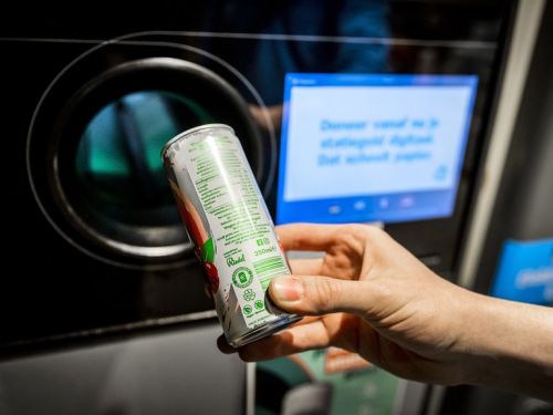 空き缶は指定された投入場所へ